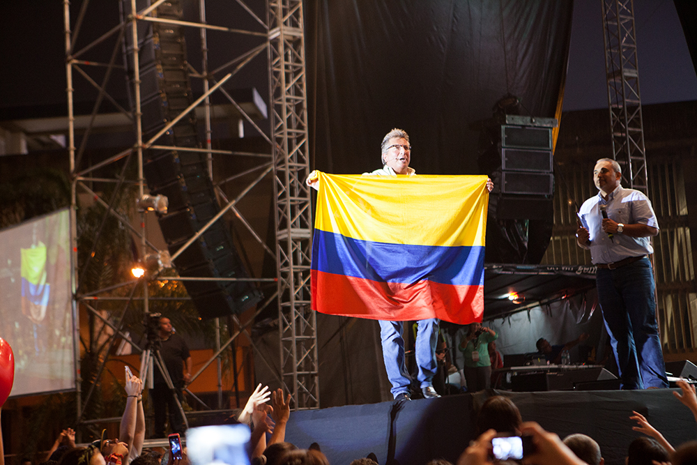 Mike Carrying the Colombian Flag at Festival